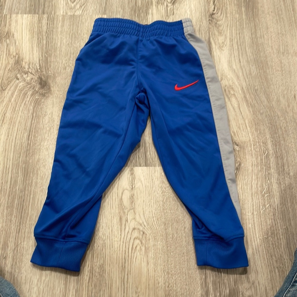 Nike jogger pants and top blue and gray